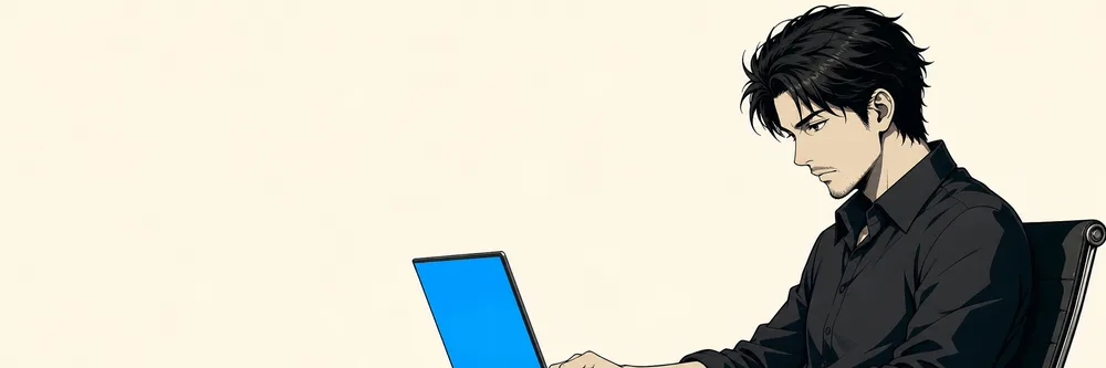 デスクでノートパソコンに向かって作業する30代の男性